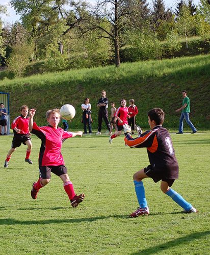 boys playing soccer