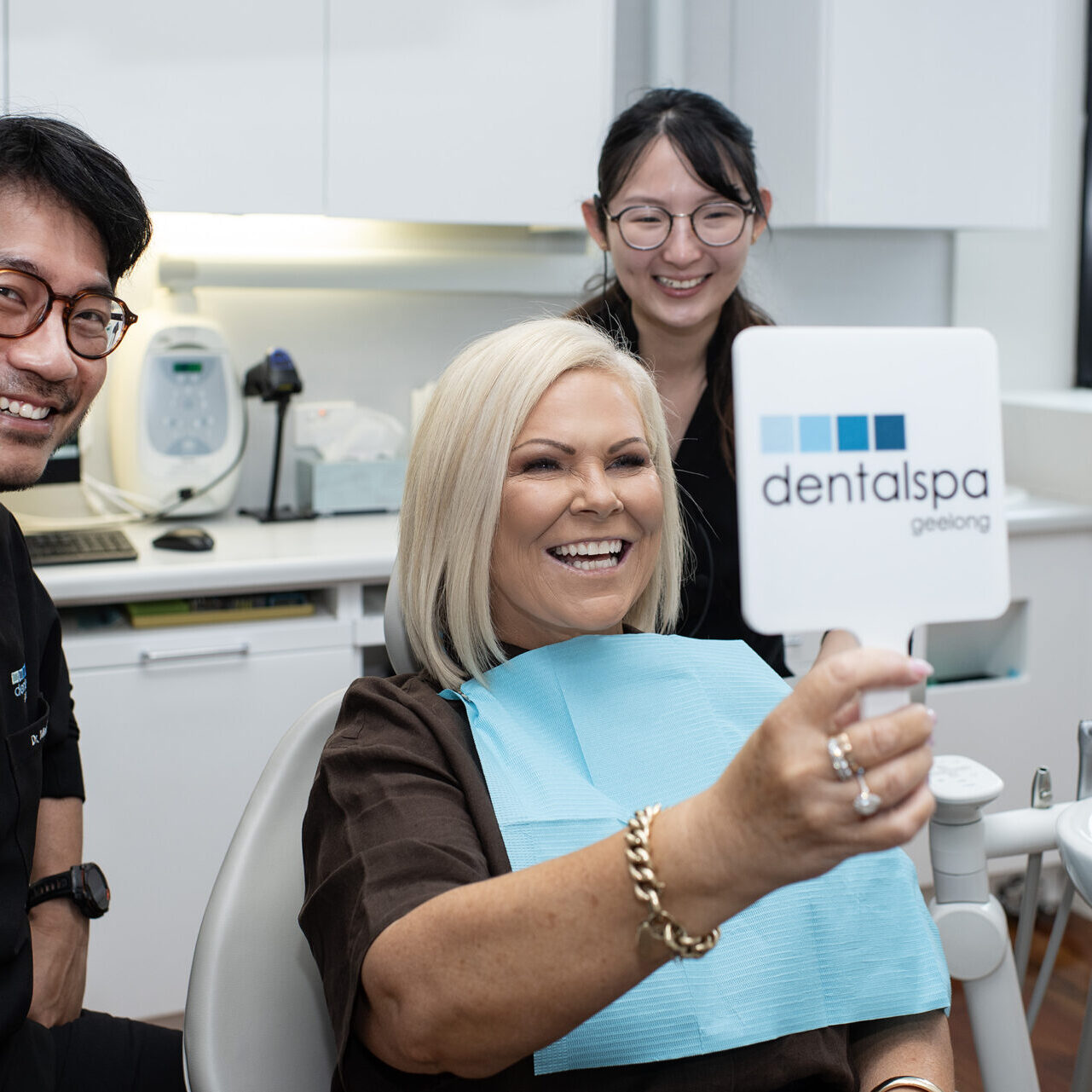 Dentalspa Geelong cosmetic dentist fitting porcelain veneers during a smile makeover consultation