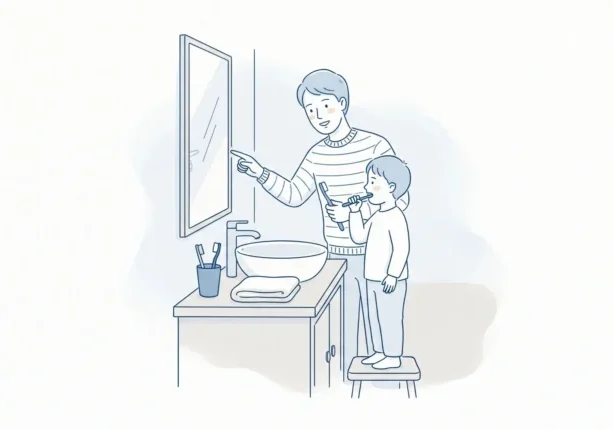 A parent helps a child practise brushing at the bathroom sink before a first dental visit.